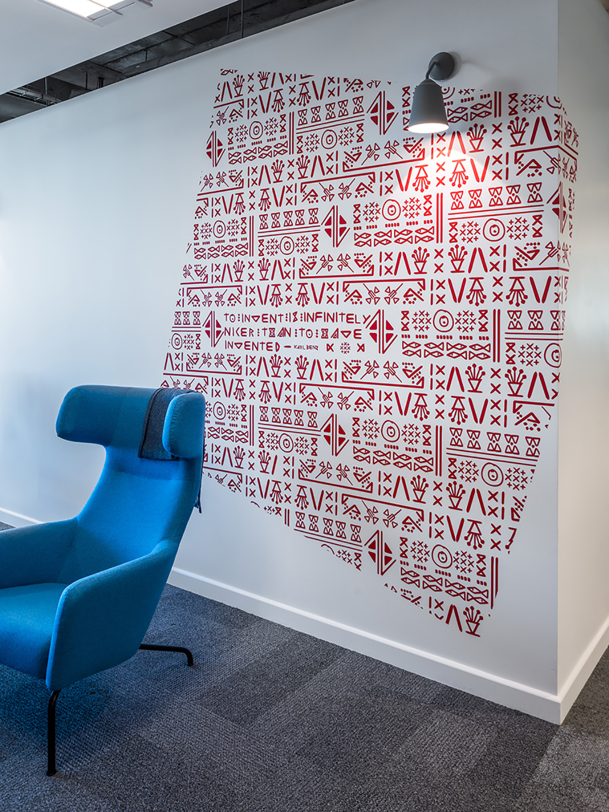 LinkedIn EMEA Office Dublin Red geometric wall graphic and blue lounge chair, LinkedIn EMEA Office Dublin