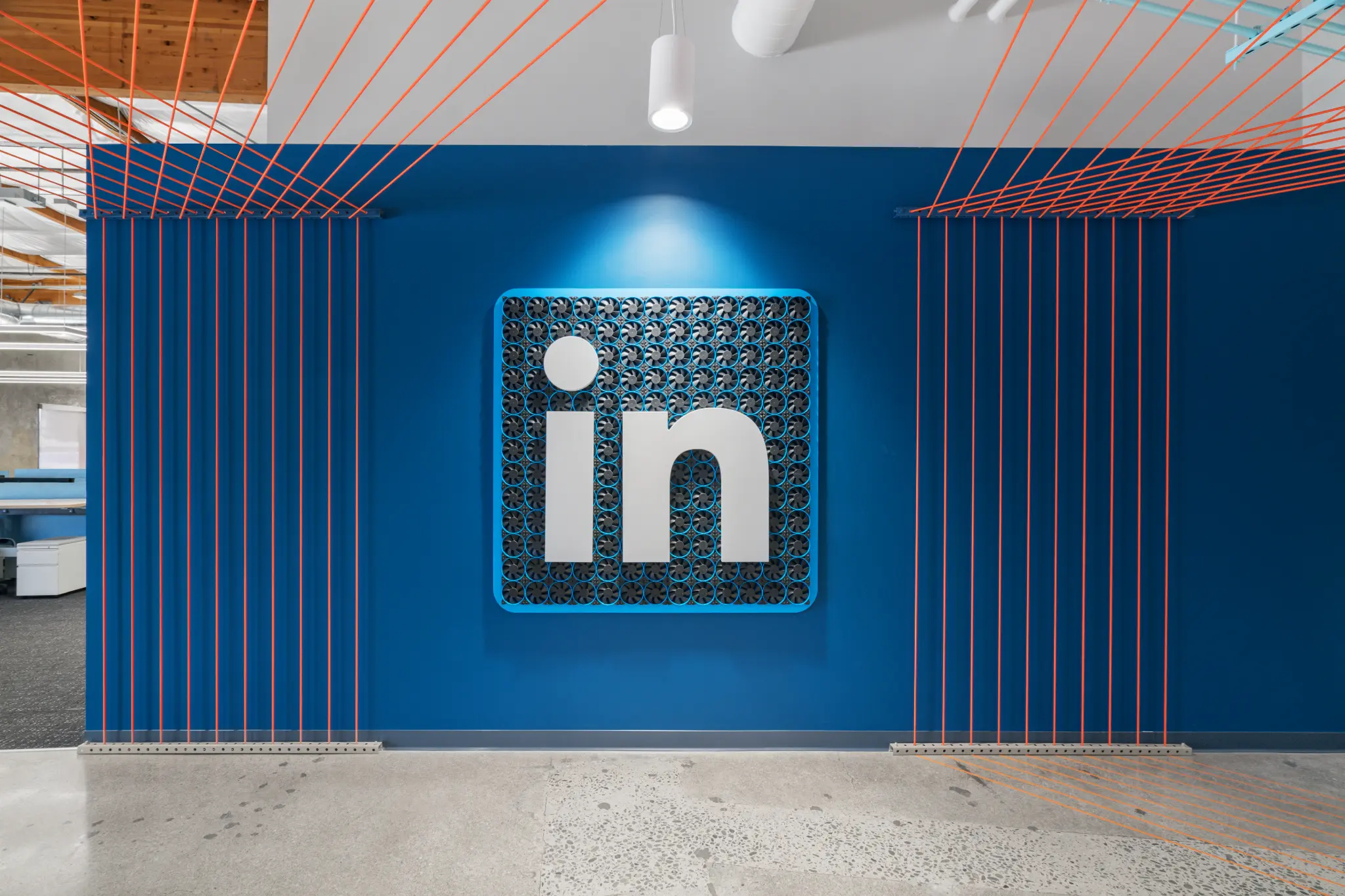 LinkedIn Silicon Valley California Blue LinkedIn logo installation with suspended orange lines